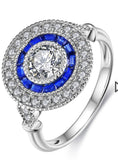 Round sapphire diamond ring